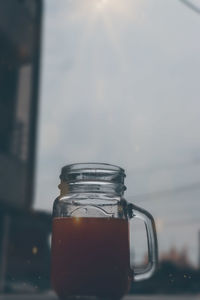 Close-up of glass jar on table