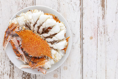 Directly above shot of seafood in plate on table