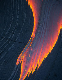 Scenic view of volcanic mountain during sunset