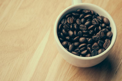 High angle view of coffee beans on table