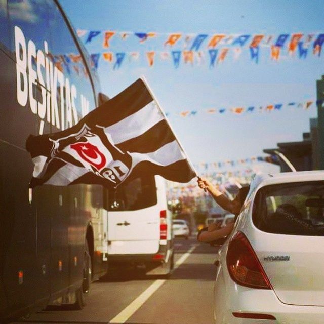 FLAG IN CITY AT NIGHT