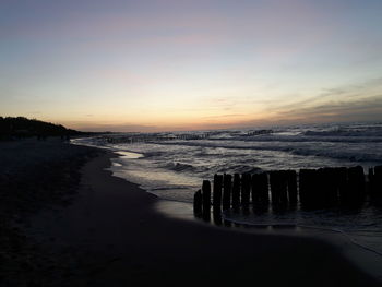 View of calm beach against the sky