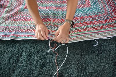 High angle view of woman holding hands