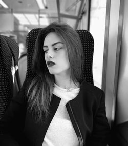 Young woman traveling in train