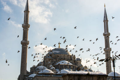 Low angle view of mosque against sky