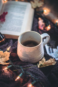 High angle view of coffee cup on table