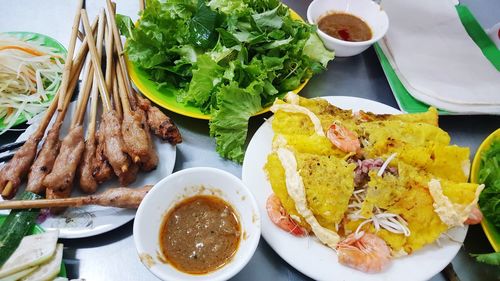 High angle view of vegetables in plate on table