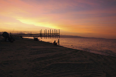 Scenic view of sea at sunset