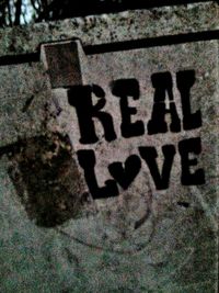 Close-up of text on wall