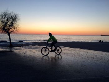 Person riding bicycle on road
