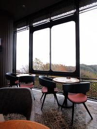 Empty chairs and table in restaurant