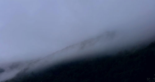 Low angle view of fog against sky