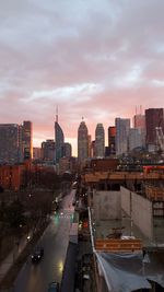 High angle view of buildings against sky during sunset