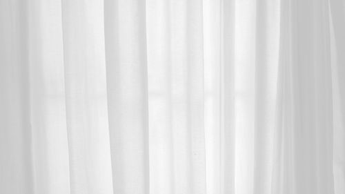 Full frame shot of curtain hanging on window