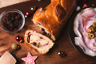 A slice of traditional venezuelan christmas food known as pan de jamon meaning ham with bread 