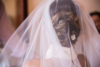 Rear view of bride wearing veil