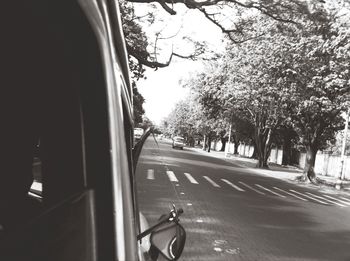 Close-up of car on street