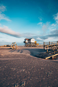 Pier over sea against sky