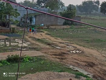 People walking on wet land