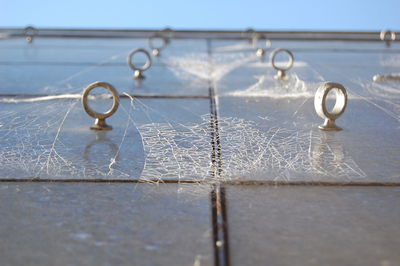 Close-up of water pipe against sky