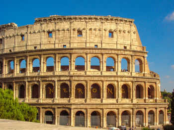 Facade of historical building against clear blue sky