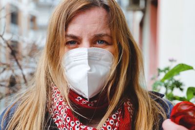 Portrait of woman with mask