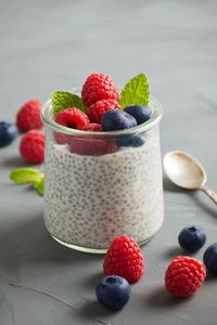 Close-up of berries in glass on table