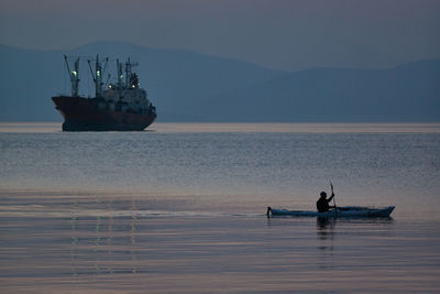 Boat on sea against sky