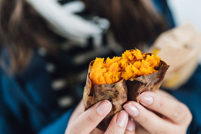 Close-up of person holding ice cream