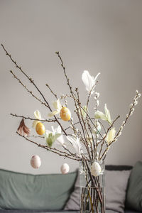 Twigs with hanging easter eggs