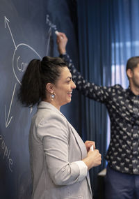 Woman having presentation at business meeting