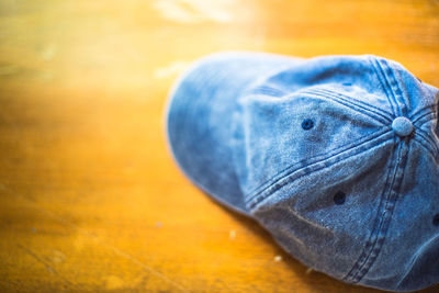 High angle view of shoes on wooden table