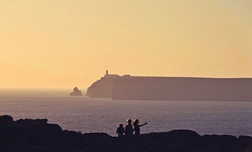 Scenic view of sea at sunset