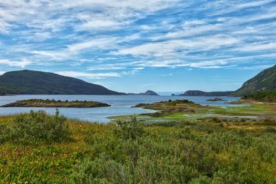 View of lake against cloudy sky