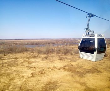 View of landscape against clear blue sky