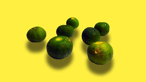 Close-up of fruits against white background