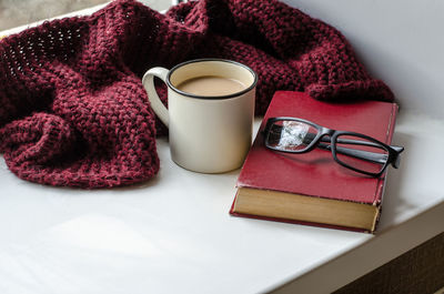 High angle view of coffee cup on table