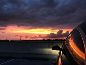 Car against sky during sunset