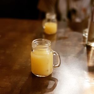 Close-up of drink in jar on table