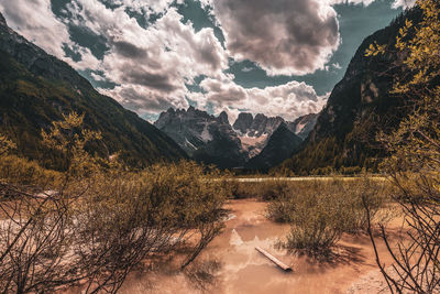 Panoramic view of lake and mountains against sky