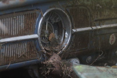 Close-up of abandoned car