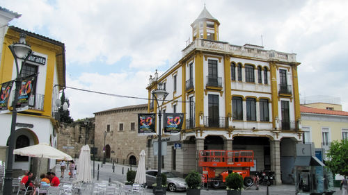 View of buildings in city against sky