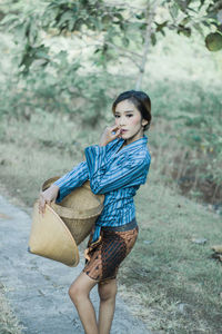 Ladies farm worker wearing traditional clothing of java