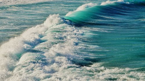 Waves splashing on rocks