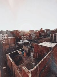 High angle view of buildings against clear sky