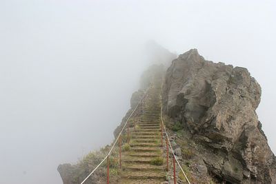 View of steps in foggy weather