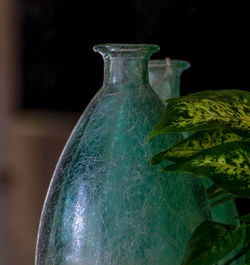 Close-up of drink in glass bottle