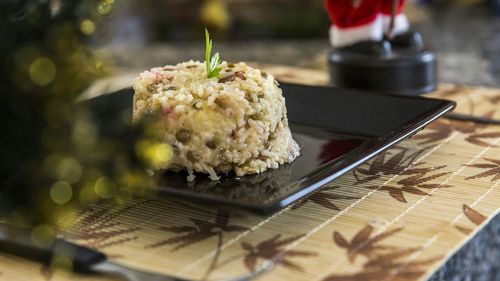 High angle view of gallo pinto in plate on table