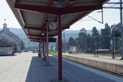 Railroad station platform against sky