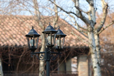 Low angle view of street light against sky